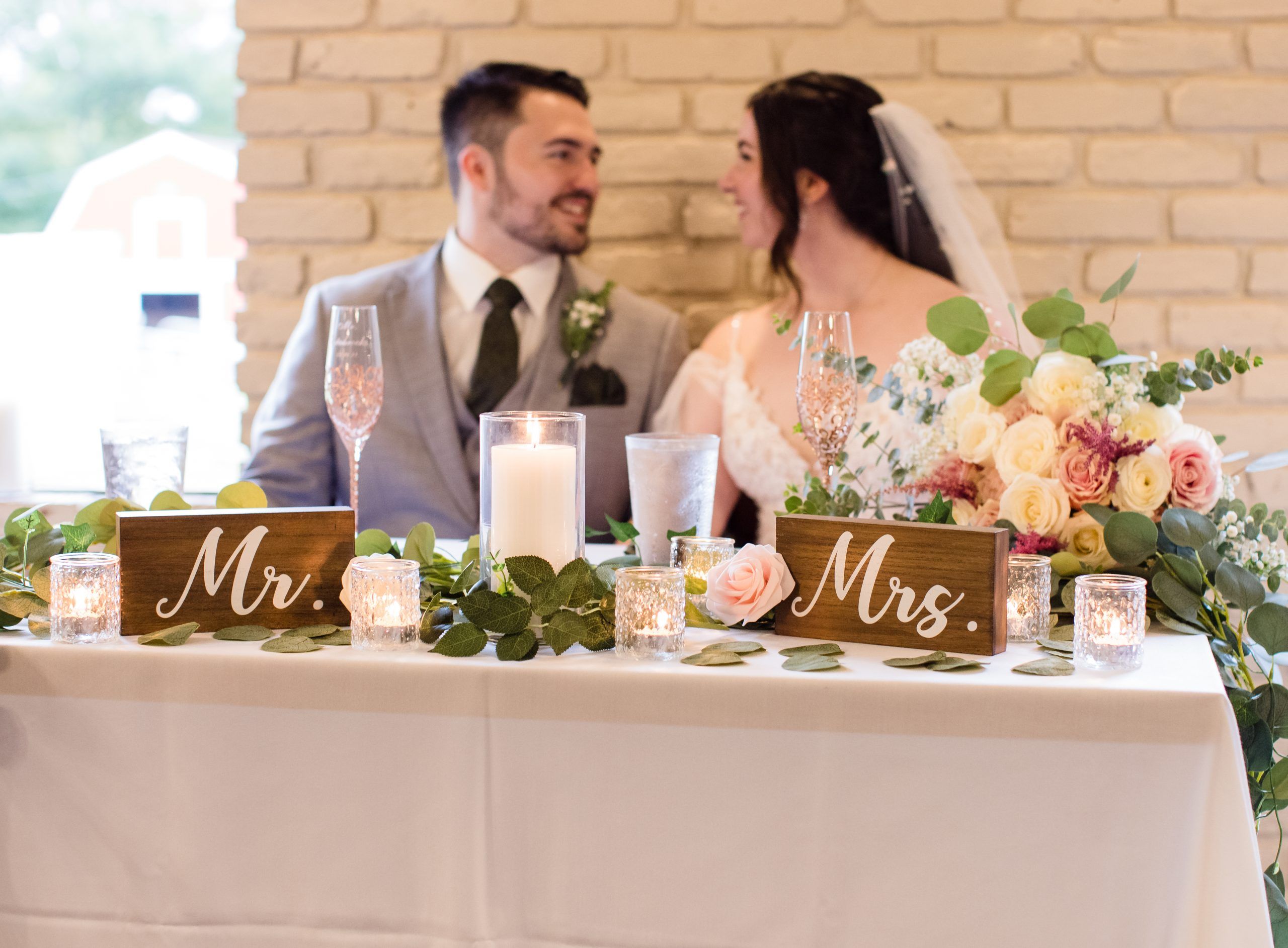 Bride and groom at sweetheart table.